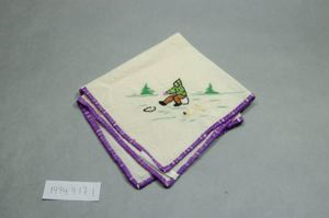 Image of Figure ice fishing,  one of a set of 3 embroidered napkins, each with single Inuit figure